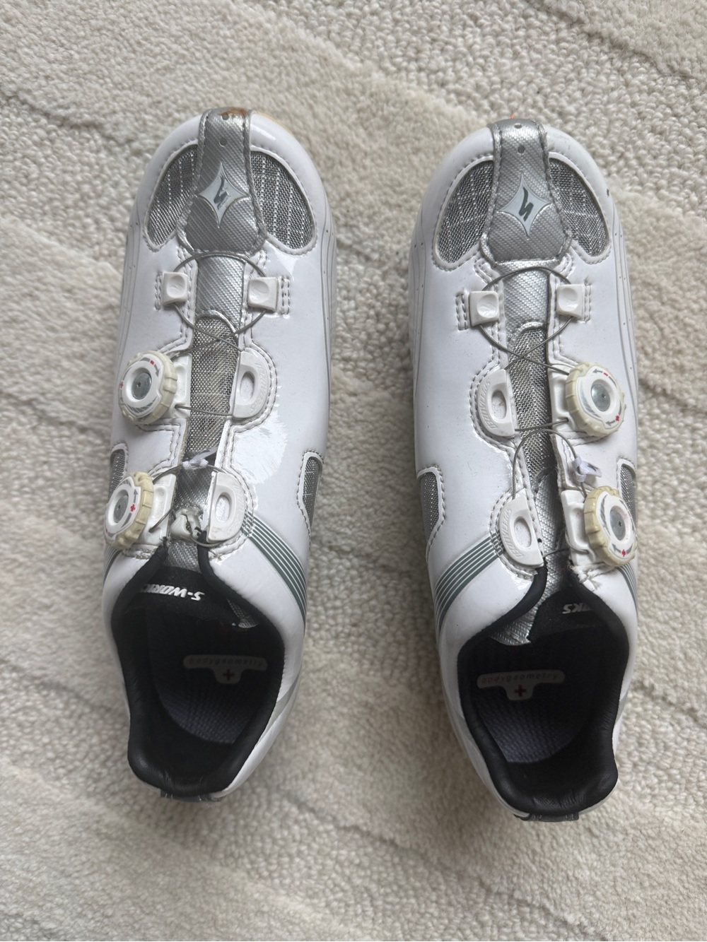 White and Silver Cycling Shoes with Dial Closures
